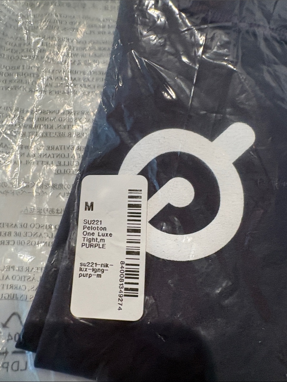 Peloton Tight Fit Performance Leggings in Charcoal Gray with White Logo NIkE